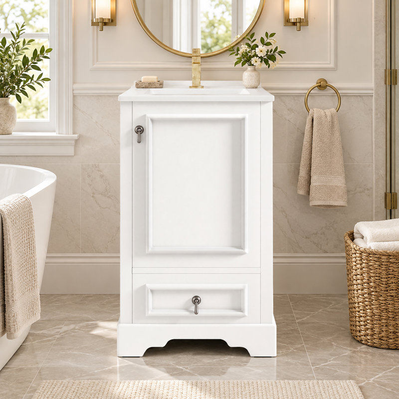 Meuble-lavabo de 51 cm (20 po) avec lavabo en céramique, porte à fermeture amortie, tiroir, tablette réglable et porte de rangement.