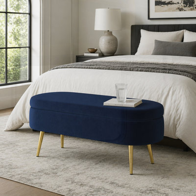 Banc de rangement repose-pieds ovale en flanelle avec pieds en métal robustes pour un décor moderne et élégant