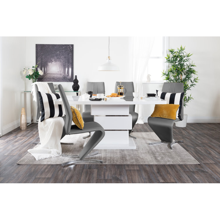Corova High Gloss Chrome Dining Table Set with 6 Modern Design Faux Leather Dining Chairs