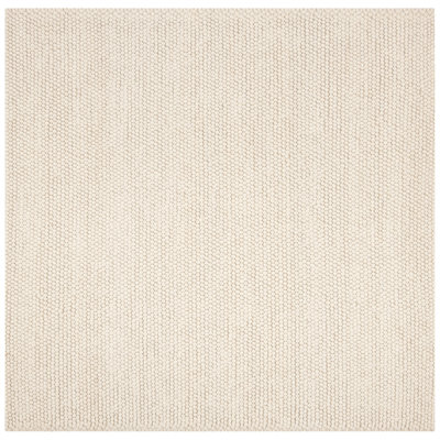 Natura Solid Color Area Rug In Ivory