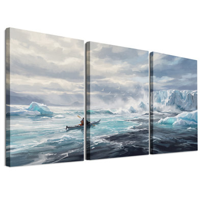 Ensemble de 3 toiles murales représentant un kayakiste pagayant près d'icebergs bleus