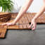 Naik 11.81'' L x 11.81'' W Solid Wood Interlocking Deck Tile in Natural