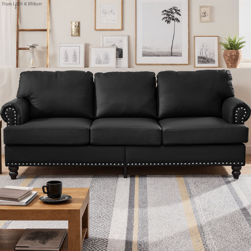 Canapé 83 places moderne en similicuir de 83 po avec garniture cloutée argentée, siège à ressorts, coussins amovibles et rangement dissimulé, pieds en bois massif brun foncé