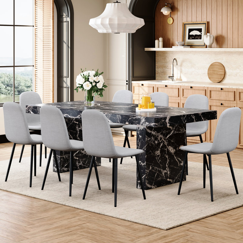 Table de salle à manger luxueuse en marbre noir de 78,7 po x 39,4 po x 29,9 po avec plateau de table de 3,5 po d'épaisseur et 8 chaises en tissu de lin gris ayant des pieds en métal, multifonctionnels pour les repas en famille et le poste de travail