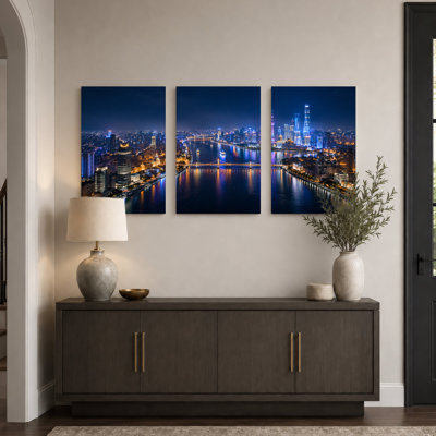 Illuminated City Skyline Over River At Night With Set Of 3 Canvas Wall Art