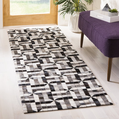 Tapis géométrique en cuir tissé à la main Patricio Studio