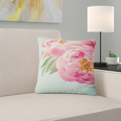 Fleurs de pivoines sur fond bleu - coussin à imprimé floral
