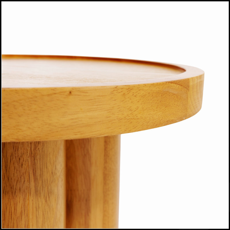 Table d'appoint ronde en bois massif avec grain naturel, idéale pour les espaces de vie modernes et chaleureux.
