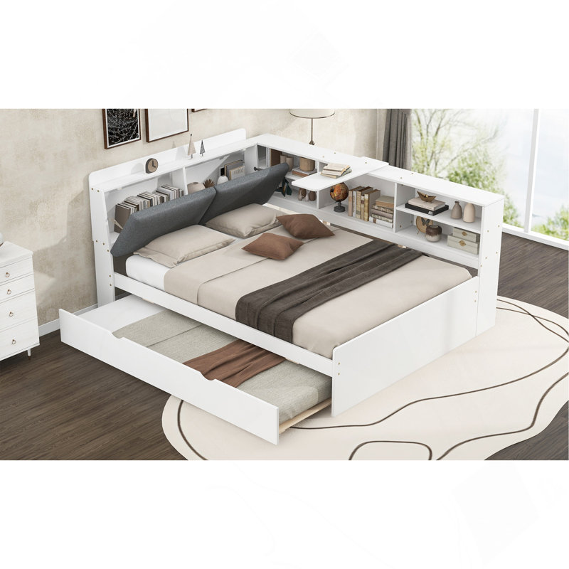 Lit plateforme en bois avec lit gigogne, tablettes et tête de lit