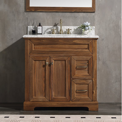 Meuble-lavabo simple sur pied de 91 cm (36 po) avec comptoir en marbre blanc de Carrare, lavabo encastré en porcelaine, tiroir à fermeture amortie et dosseret.