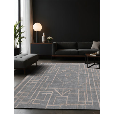 Tapis gris soyeux et moelleux