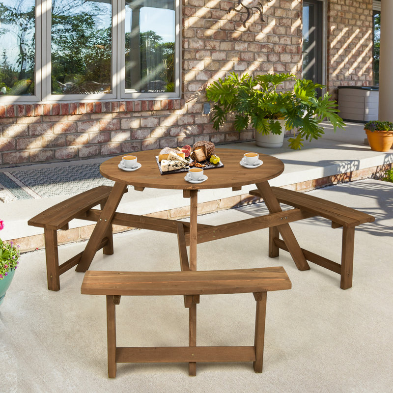 Bacopa 6 - Person Solid Wood Patio Dining Set Round Table