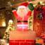 Décoration de Noël père Noël dans une cheminée gonflable