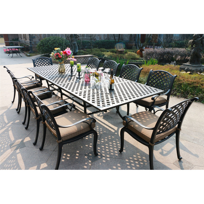 Annecorinne 10 - Person Patio Dining Set with Rectangular Table , Cushions Included, Dupione Brown, Dark Lava Bronze