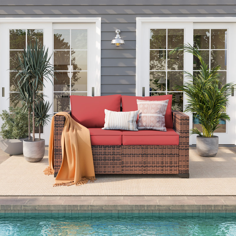 Shawhin 55.5'' Polyethylene (PE) Wicker Outdoor Patio Loveseat, Wine