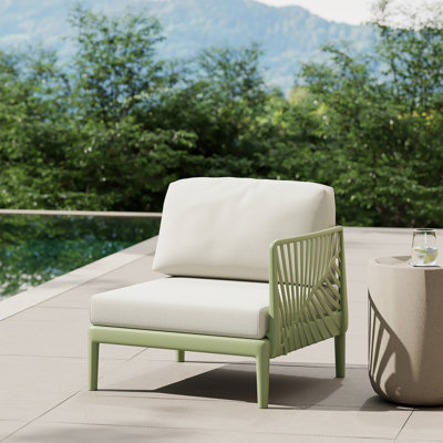 Chaise de patio avec accoudoirs profonds et coussins