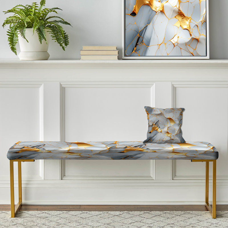 Banc rembourré doré doré et doré