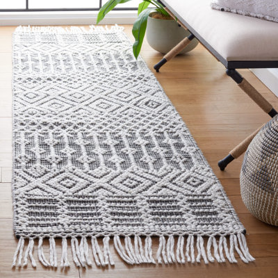 Tapis noir / ivoire tissé à la main Randalia