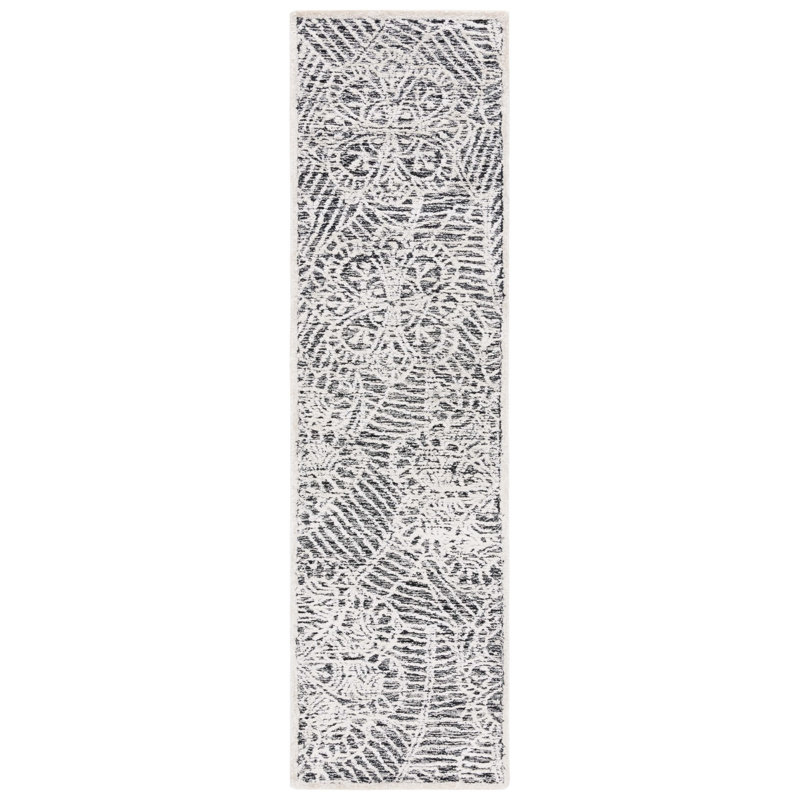 Tapis floral en laine / soie de bambou touffeté à la main avec envers en coton ivoire / noir Geesey
