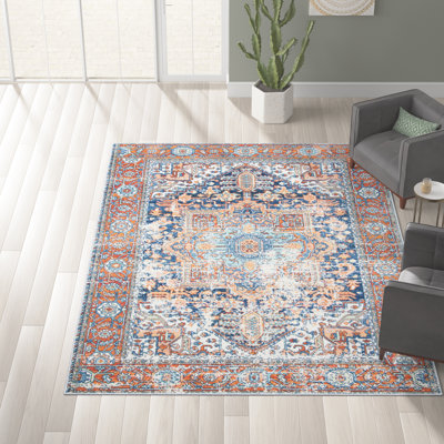 Fessler Oriental Navy/Rust Area Rug