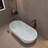 63 in. Freestanding Soaking Solid Surface Bathtub-98606634