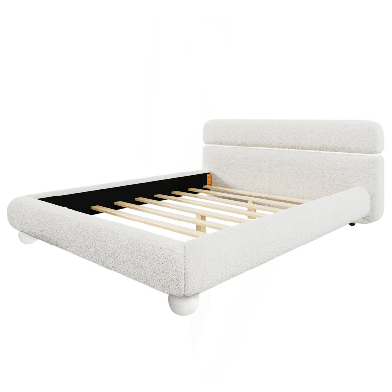 Lit tapissier contemporain avec tissu bouclé en molleton et pieds ronds massifs, design courbé élégant pour la chambre à coucher
