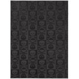 Tapis noir à motifs géométriques