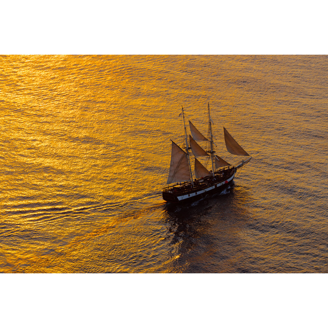 Sailing Ship In Evening by Elxeneize - Wrapped Canvas Print