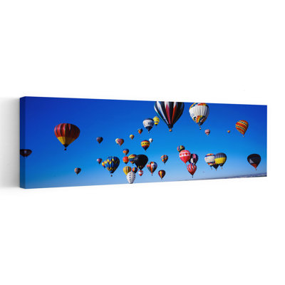 Hot air balloons floating in sky Albuquerque International Balloon Fiesta Albuquerque Bernalillo County New Mexico USA 1 Piece Wrapped Canvas Panoramic Wall Art