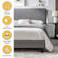 Lit tapissier grand, gris, pour une expérience de chambre à coucher paisible