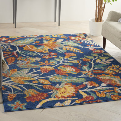 Tapis bleu marine à motif floral Lakenya