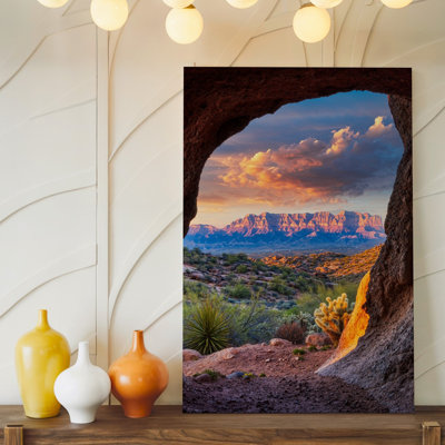 Canvas A Breathtaking View Framed By A Rocky Cave Entrance Showcasing Wall Art A Vibrant Sunset Over Rugged Canyon Landscapes The Canvas Wall Art
