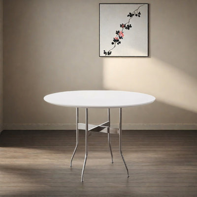 Une table ronde au design géométrique minimaliste moderne