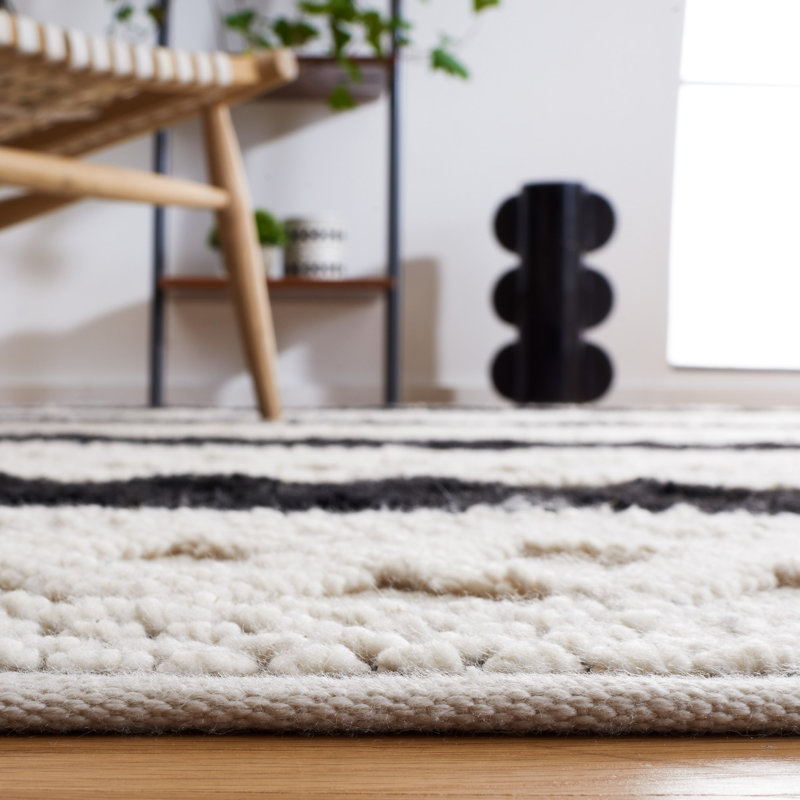 Handmade Black and Ivory Wool Geometric Area Rug