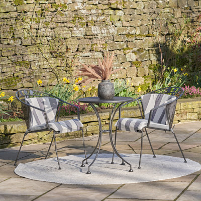 2 - Person Steel Patio Dining Set Round Table with Cushions Included