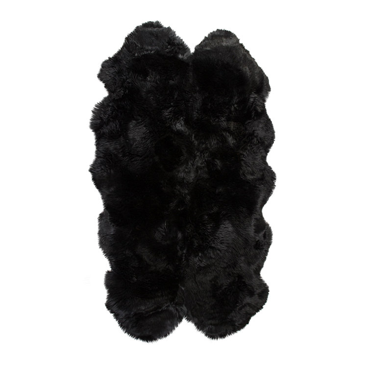 Munsey Handmade Sheepskin 4' x 6' Area Rug in Black