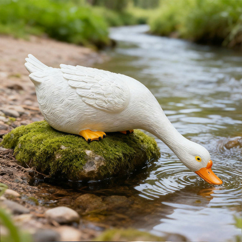 Statue d'extérieur réaliste en forme d'oie blanche résistante aux intempéries pour animaux