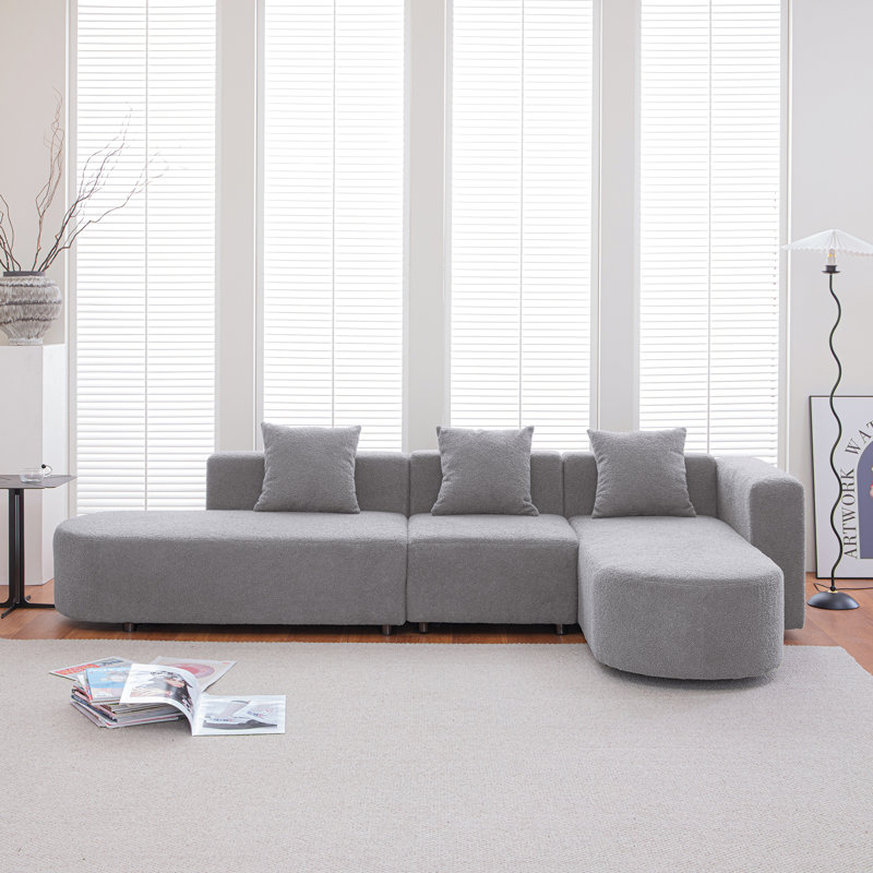 Canapé moderne en forme de L sans os avec siège incurvé, Boucle gris