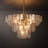 Kethe Oversized 13-Light Tiered Chandelier with Seeded Glass