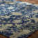 Dassiah Hand Knotted Wool Floral Area Rug in Blue