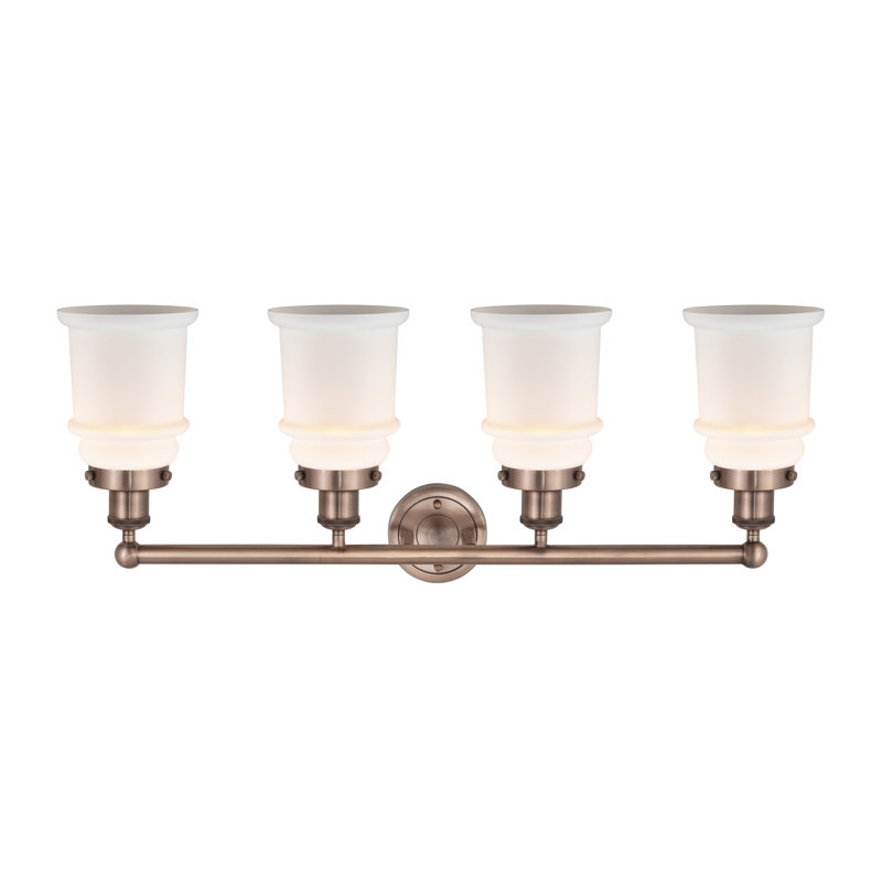Éclairage pour meuble-lavabo de salle de bain 4 lumières Cailen de la collection Edison, Blanc mat, Antique Copper