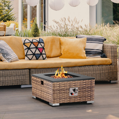 Eryberto 11'' H x 23.6'' W Outdoor Fire Pit Table with Lid