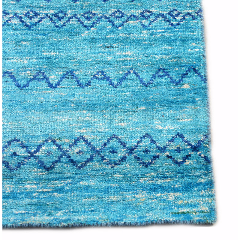 Tapis turquoise noué à la main 5 x 8