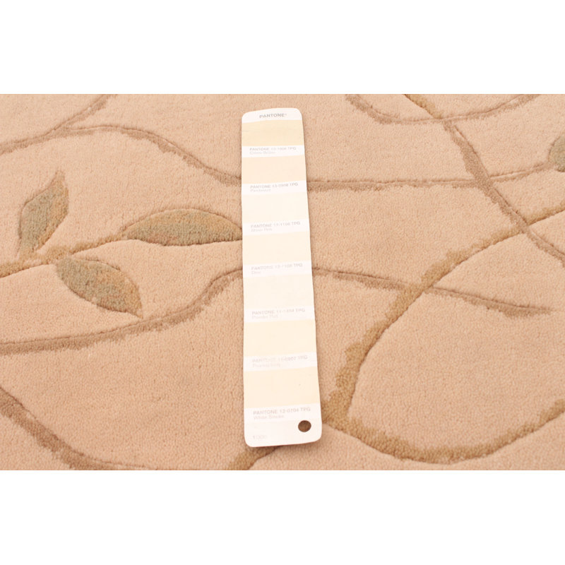 Tapis beige en laine à motif abstrait Caysin