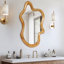 Miroir mural 33,46 "x 22,24" de forme irrégulière avec cadre en bois naturel