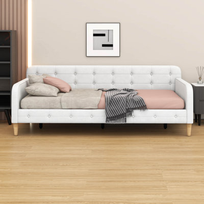 Structure de lit de jour rembourrée avec 4 pieds en bois - Canapé-lit multi-usage pour les salons et les appartements, aucun sommier nécessaire