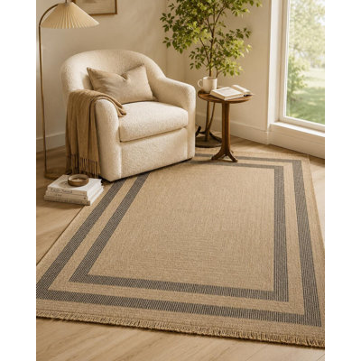 Black textured flatweave machine-woven polypropylene area rug