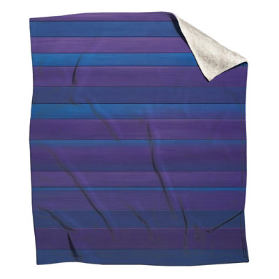 Couvertures à rayures bleues et mauves