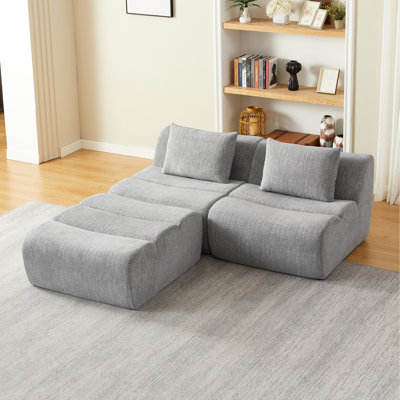 Canapé 3 places compressé en chenille grise, livré monté, idéal pour appartement, confortable et peu encombrant, avec soutien en mousse et ressorts ensachés. Doux au toucher, design élégant, prêt à l'emploi.