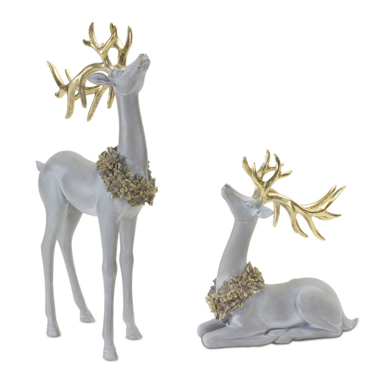 https://assets.wfcdn.com/im/41465867/resize-h755-w755%5Ecompr-r85/2478/247800049/Winter+Deer+Figurine+with+Wreath+%28Set+of+2%29.jpg